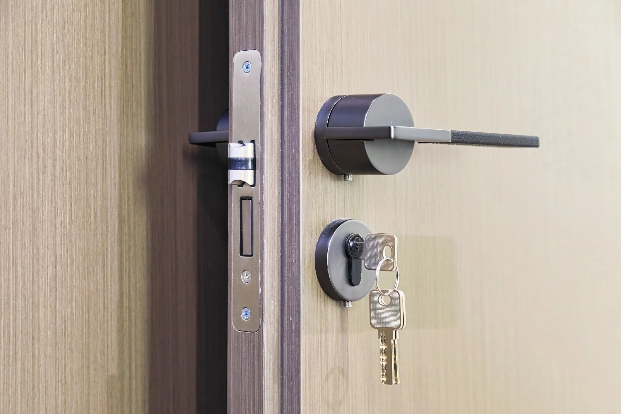 Close-up of a high-quality door lock and key