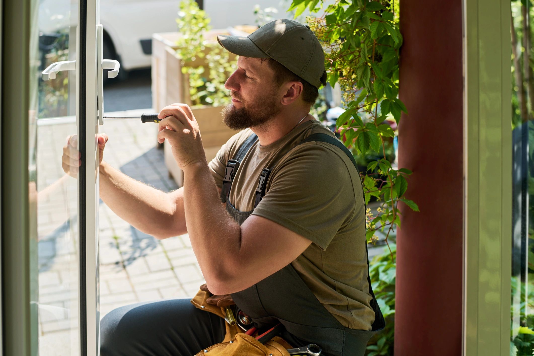 Locksmith technician repairing a door lock